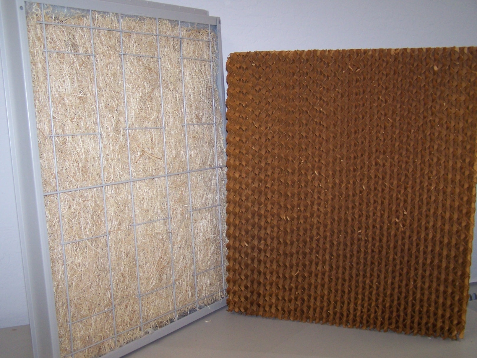 What is the difference between Aspen pads and Rigid Media pads